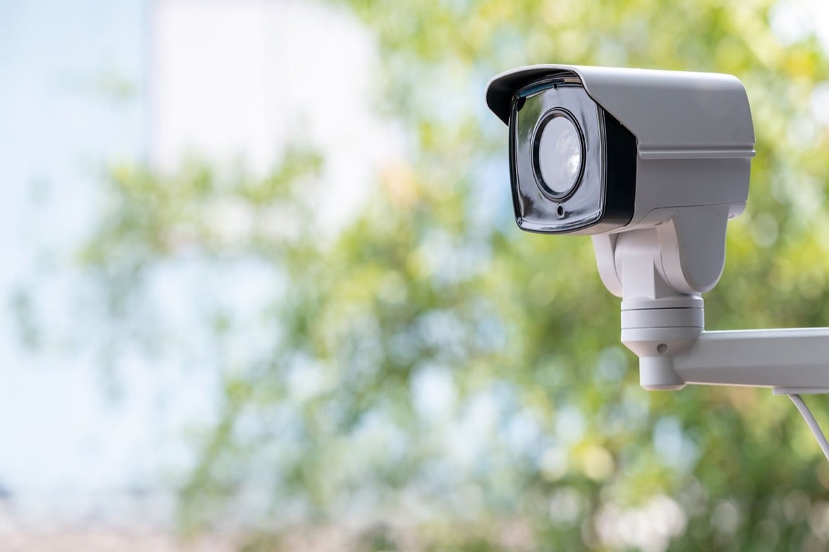 CCTV camera installation on a residential wall